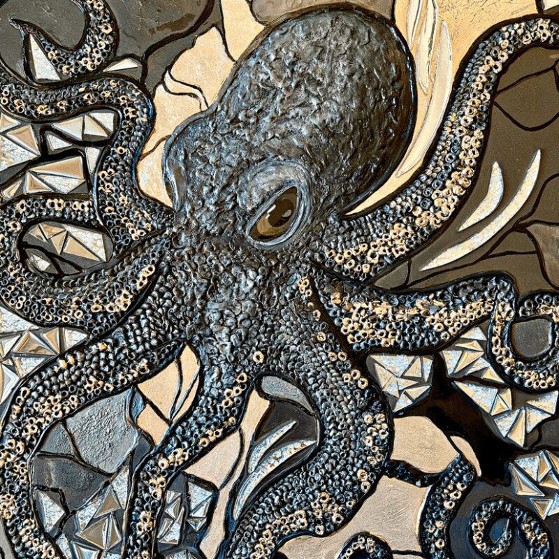 Octopus surrounded by fractured geometric and jewel-like forms